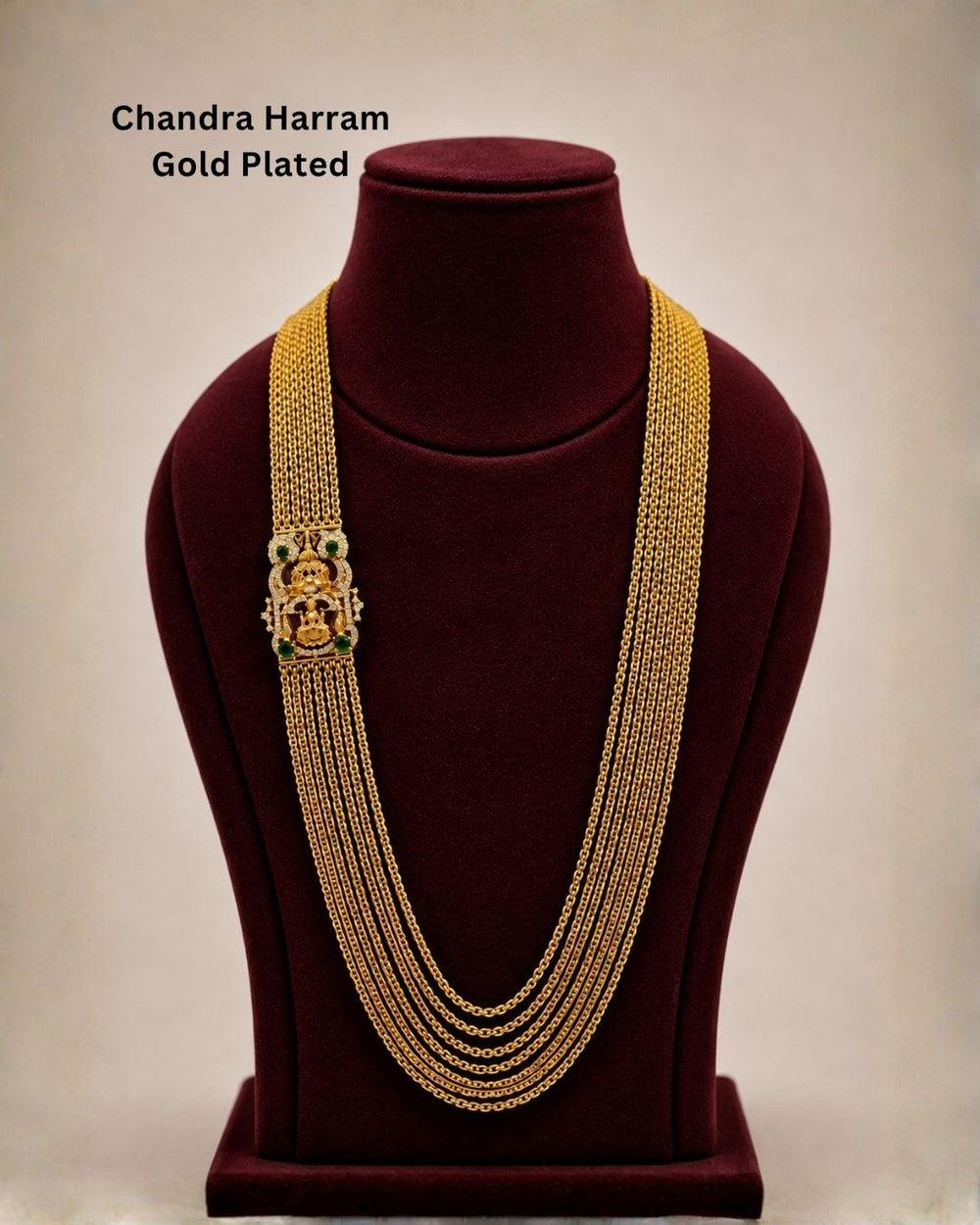 Premium temple style gold plated Lakshmi Chandraharam designed with multiple layered chains, traditional craftsmanship, and a detailed Lakshmi motif for ethnic and bridal jewellery collections.