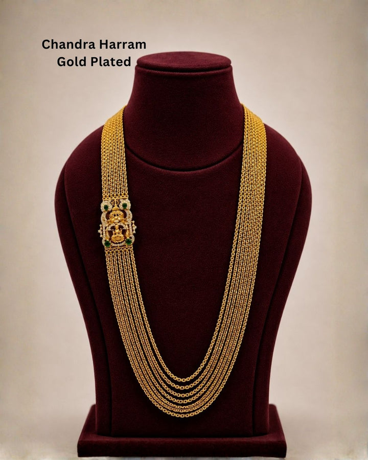 Premium temple style gold plated Lakshmi Chandraharam designed with multiple layered chains, traditional craftsmanship, and a detailed Lakshmi motif for ethnic and bridal jewellery collections.