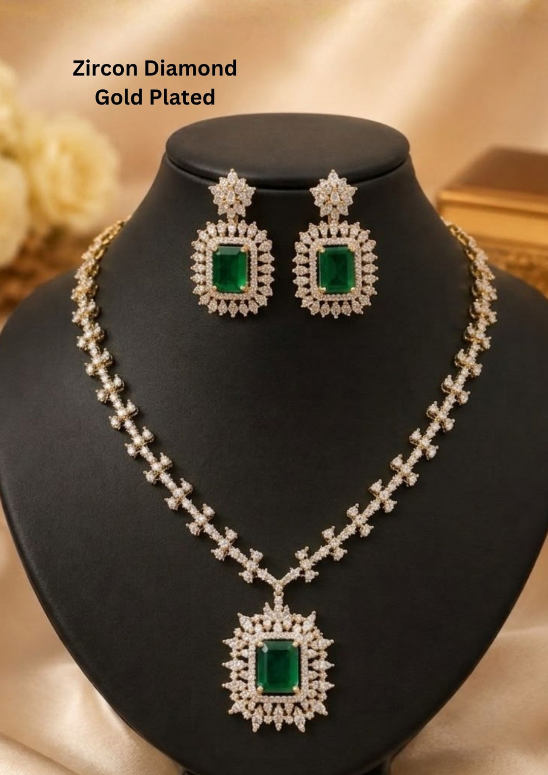 Gold-plated zircon diamond jewelry set featuring a necklace and matching drop earrings displayed. The set features rectangular green emerald-cut stones surrounded by sparkling clear stones in silver-toned settings. Lightweight and perfect for weddings, parties, festive occasions, and special celebrations.