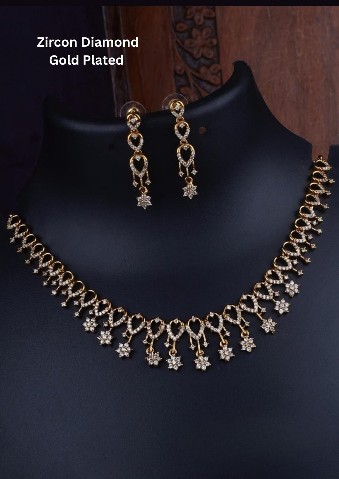 Zircon diamond gold-plated heart shape necklace and earrings with classic model and shown very detailed in picture how it looks and do use for weeding's , festivals and can gift and kitty party's 
