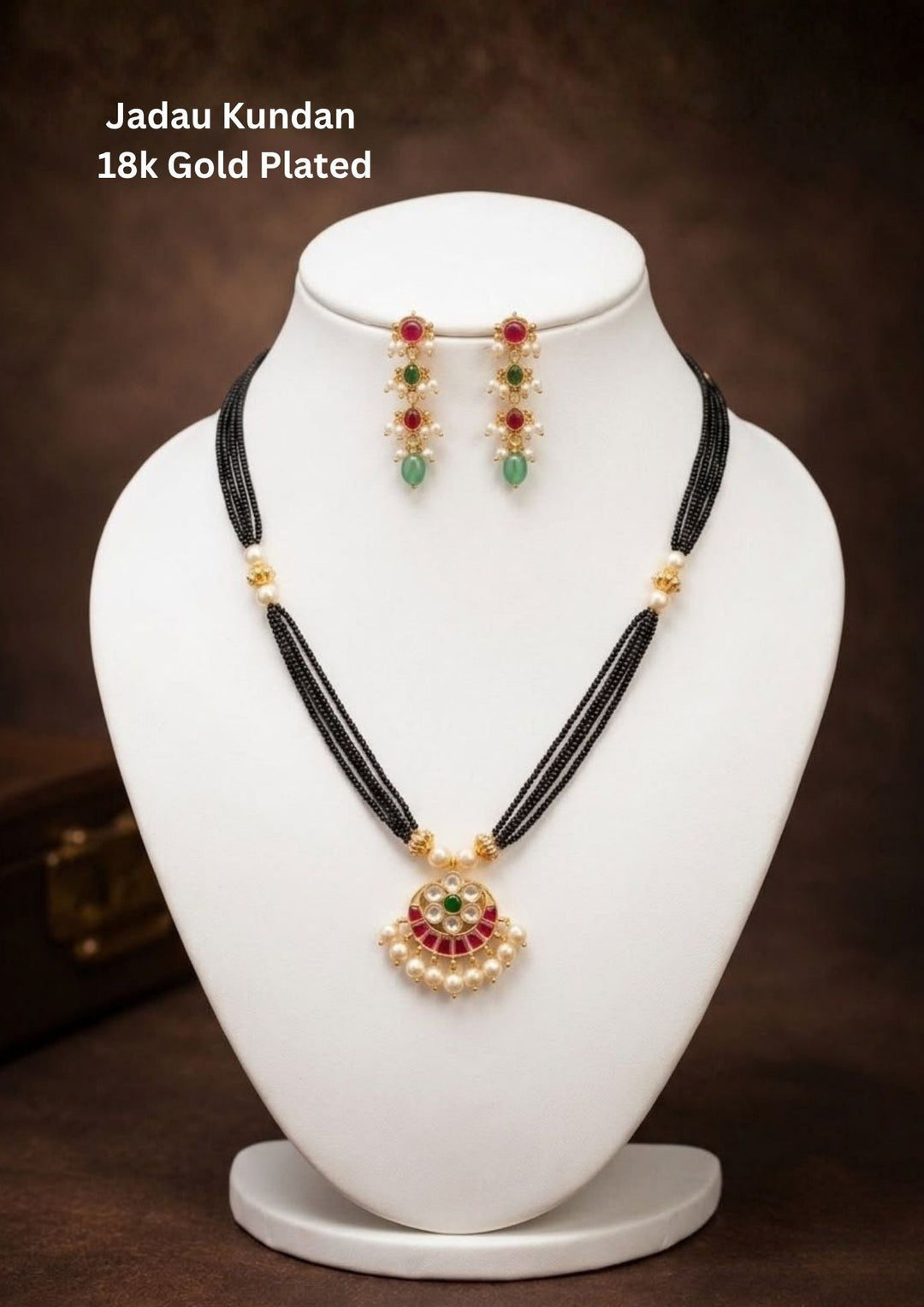 Jadau Kundan Gold Plated 18k Mangalsutra with 3 step earrings designed with 5 rows of black beads with jadau kundan locket and matching earrings perfect for functions, festivals, weddings and it is anti fade color and skin friendly