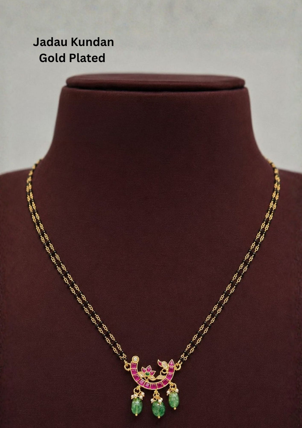 black beads mangalsutra chain featuring a slim gold plated chain with evenly spaced traditional black beads and a curved center pendant decorated with tiny dangling zircon stones. The lightweight 18 to 20 inch necklace gives a modern minimal look suitable for daily wear, office wear, married women, festive occasions and traditional outfits.