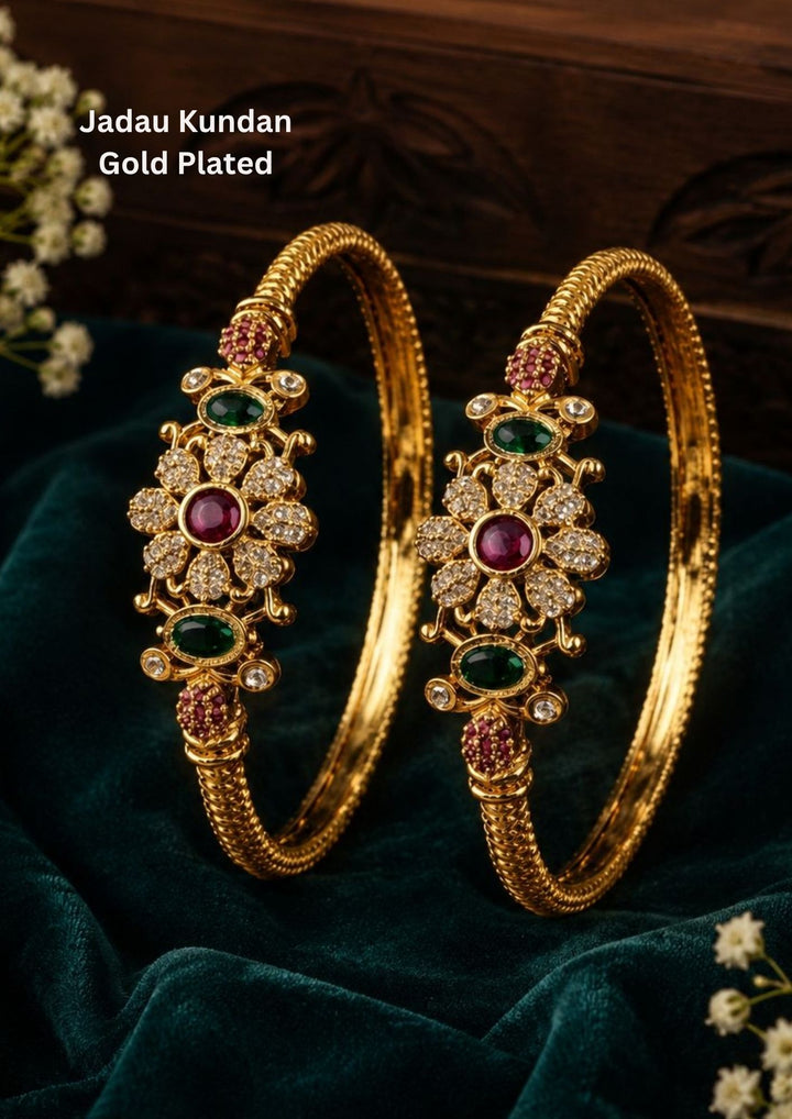Jadau Kundan Gold Plated Flower Bangles designed with floral kundan stone work,  with kempu stones and traditional handcrafted bangle design, premium gold plated finish, lightweight structure, sweat proof coating, anti-fade colour protection, and skin-friendly wear suitable for weddings, festivals, pooja functions, bridal wear, and cultural celebrations.