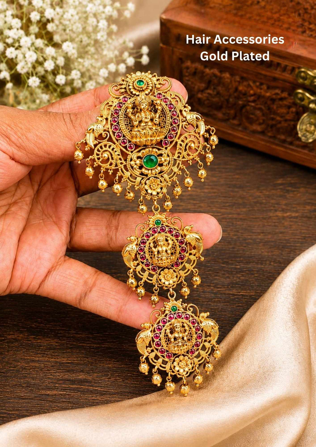 Jadau Kundan Gold Plated Laxmi Devi Hair Accessories  designed with pink and green stones in three steps with  godesslaxmi and peacock design it is Lightweight, Anti-Tarnish, Perfect for dailywear, weddings & festivals. 