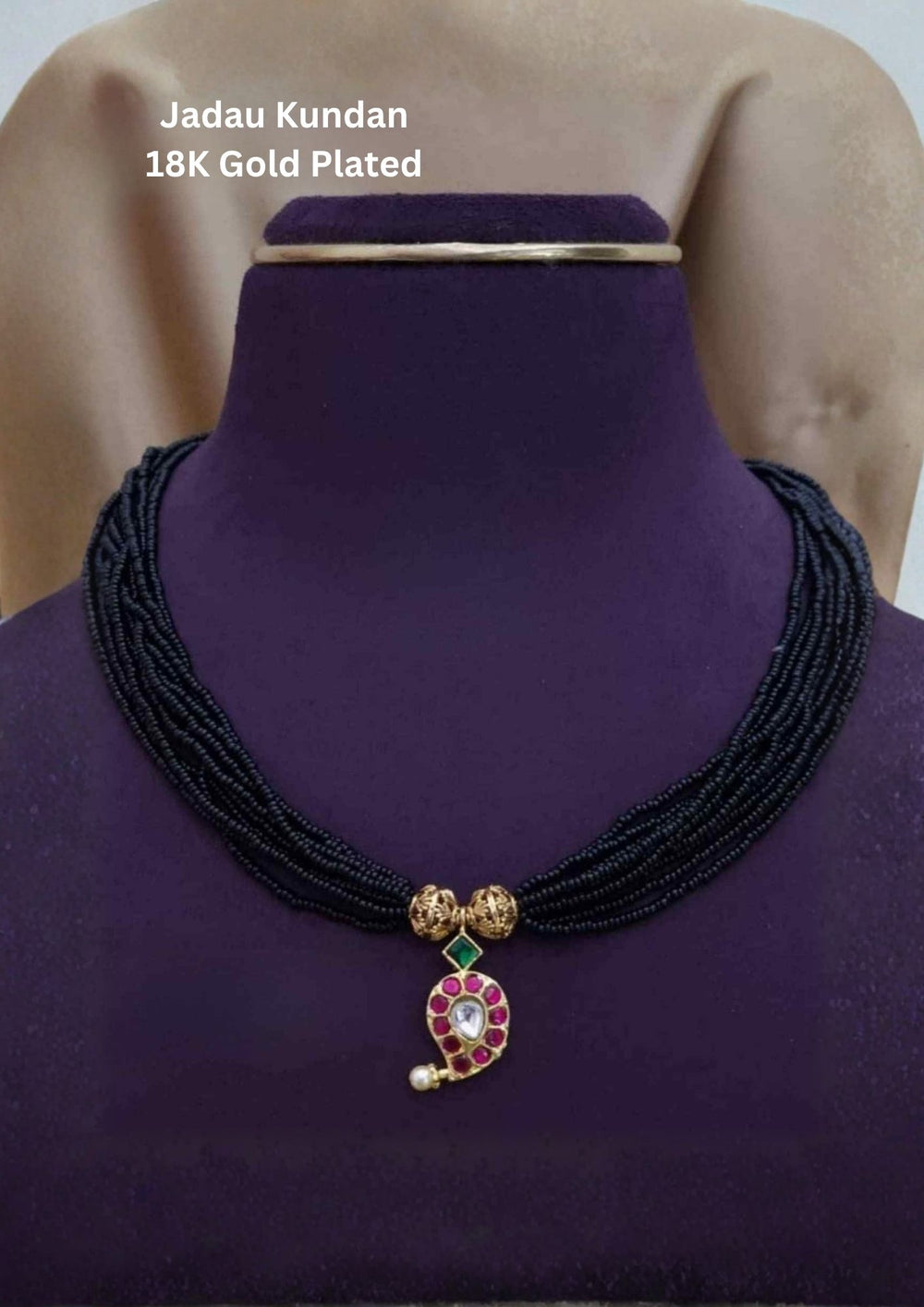 Jadau Kundan Gold Plated Mangalsutra design with traditional black bead chain, mango pendant design, kundan stone detailing, antique gold plated finish, lightweight and perfect for daily wear , pooja functions, festivals, and wedding wear.