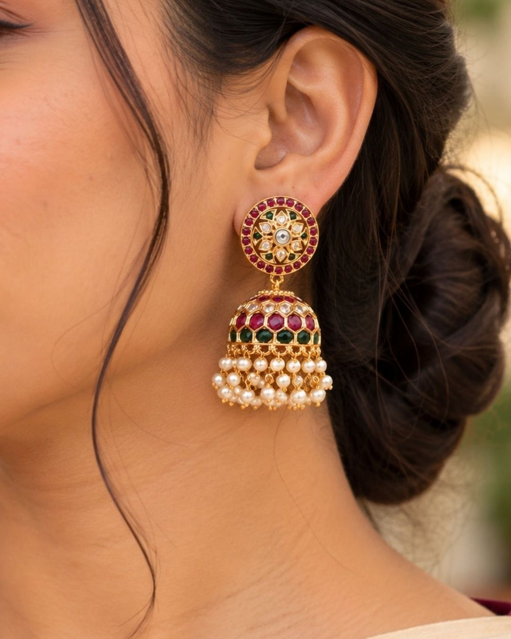 Gold-plated Jadau Kundan earrings designed in round alignment and with flower shape comes with zircon stones and the dome shaped is designed with guttausalu perfect for weddings, function