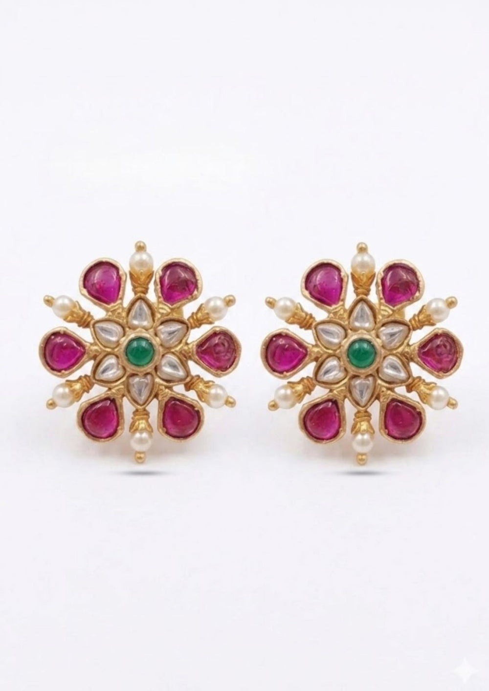 Gold-plated Jadau kundan studs with screw back come with pink gemstone and looks very elegant and  comes with much detailed look and can use for daily ware, functional ware, festive ware nad perfect for giffting 