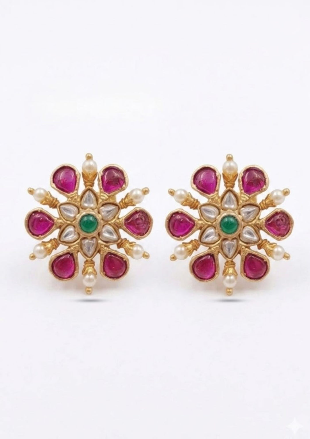 Gold-plated Jadau kundan studs with screw back come with pink gemstone and looks very elegant and  comes with much detailed look and can use for daily ware, functional ware, festive ware nad perfect for giffting 