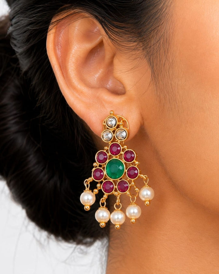 Beautiful Jadau Kundan gold plated necklace set featuring a ruby and green stone design, detailed Kundan work, and delicate pearl drops. Perfect for festive occasions, traditional outfits, weddings, parties, and gifting.