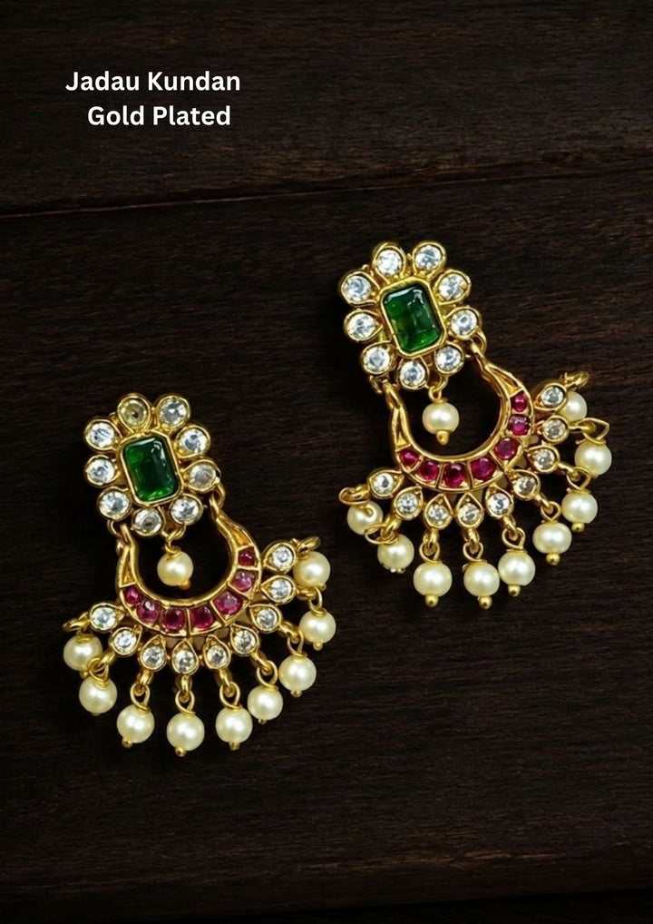 Gold-plated earrings with green and red stones with Peral drops chandbali earrings with jadau kundan and shown clearly how it looks can be used for festivals and weeding&