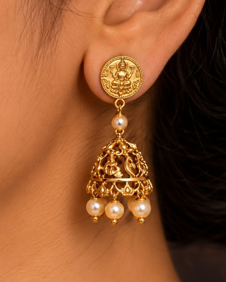 South Indian women styling an antique gold plated temple choker necklace set designed with detailed Laxmi Nakshi patterns and an elegant matte gold finish that gives a graceful traditional look for festive celebrations, poojas, family functions, and bridal outfits with lightweight comfortable use and COD available now.