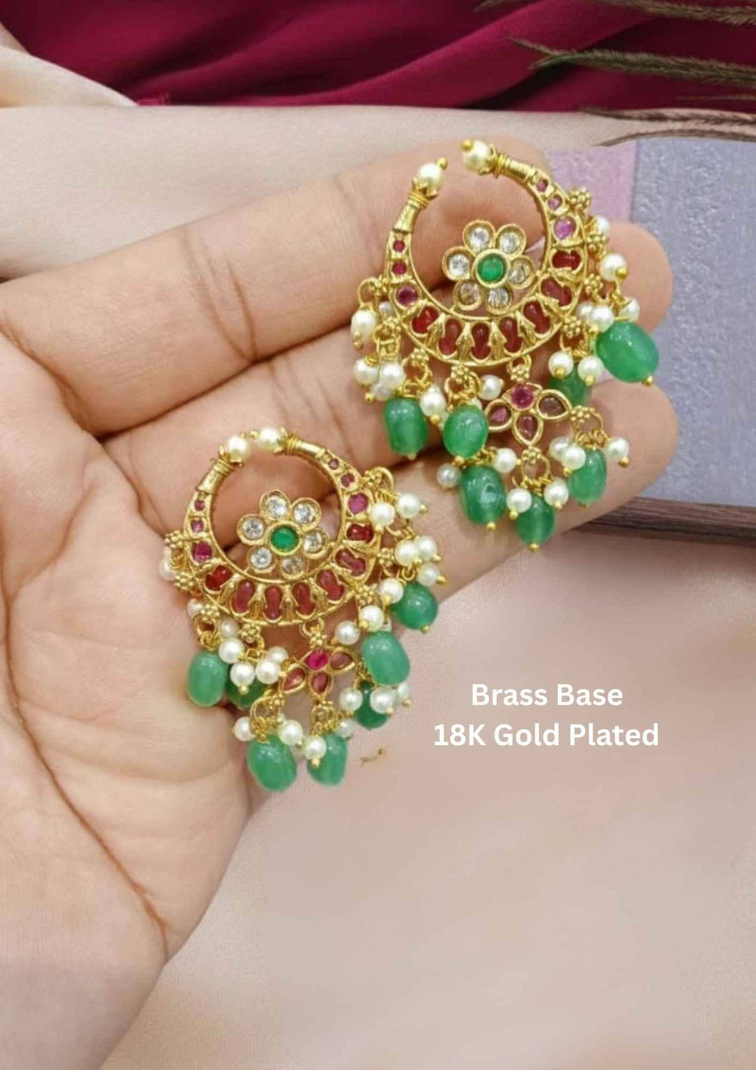 Gold-plated earrings with green and red stones