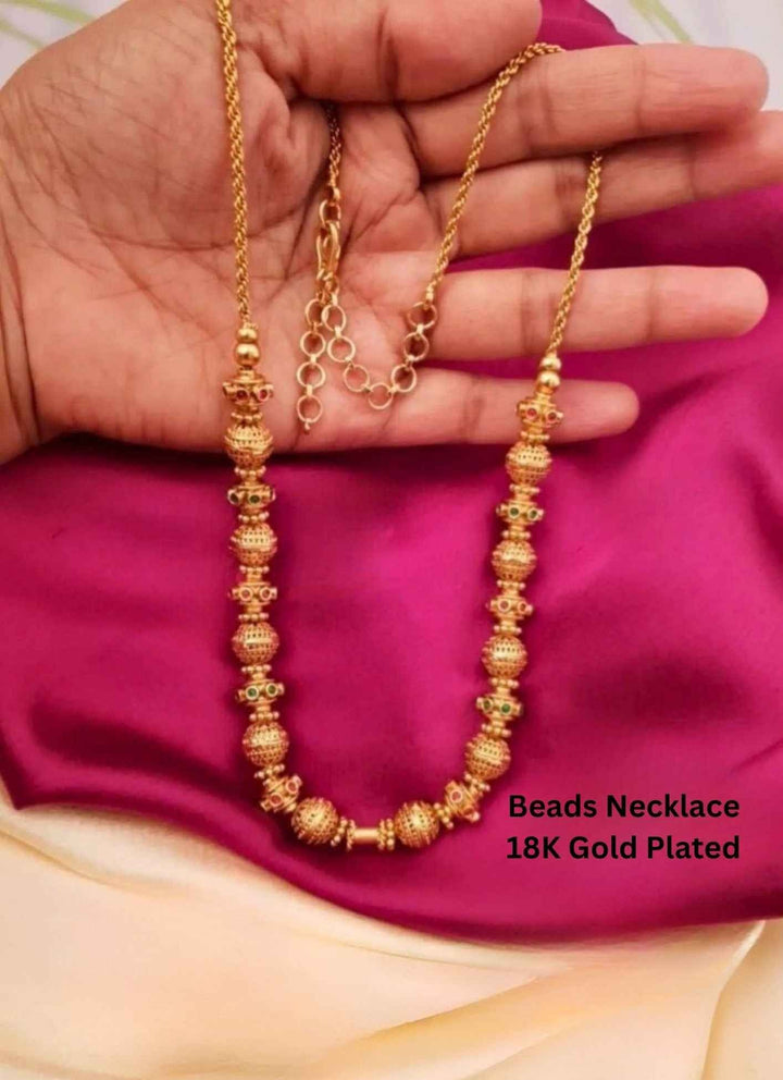 Gold beaded necklace  
