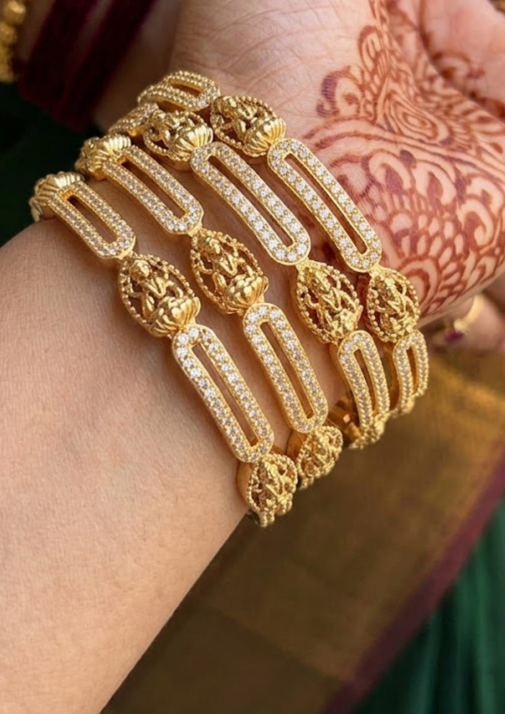 Kundan Gold Plated Temple Lakshmi Bangles ( Set of 4 ) Model Pic
