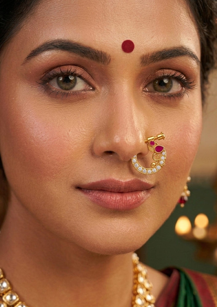 Close-up of a south indian woman wearing traditional nose pin Gold-plated nose pin with gemstones show very clearly how it look and nose pins are indian traditions to women can be used for weeding's , bridals and festivals and anti faded sweat proof 