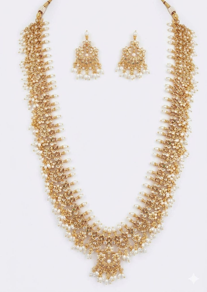 Gold plated haram set rice beads with design with white background flat lay detail for pooja, festivals weeding's  south indian festivals