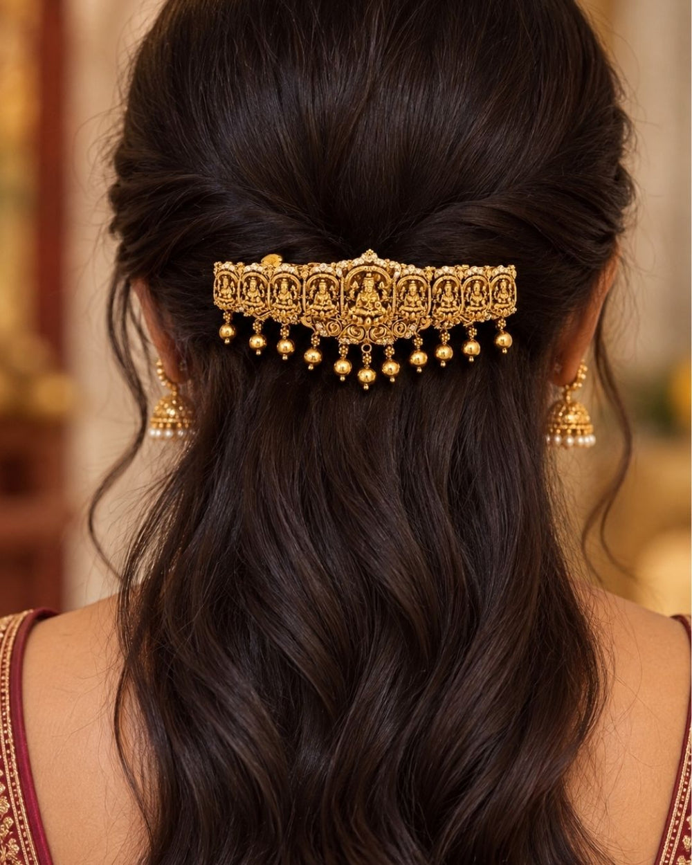 Laxmi gold plated hair clip designed with goddess Lakshmi in antique temple jewelry design, shining with white stones and hanging gold bead drops, with metal clip closure, suitable for bridal hairstyles, weddings, festivals, poojas, Bharatanatyam, sarees, lehengas, and traditional South Indian ethnic hair styling with rich royal appearance.