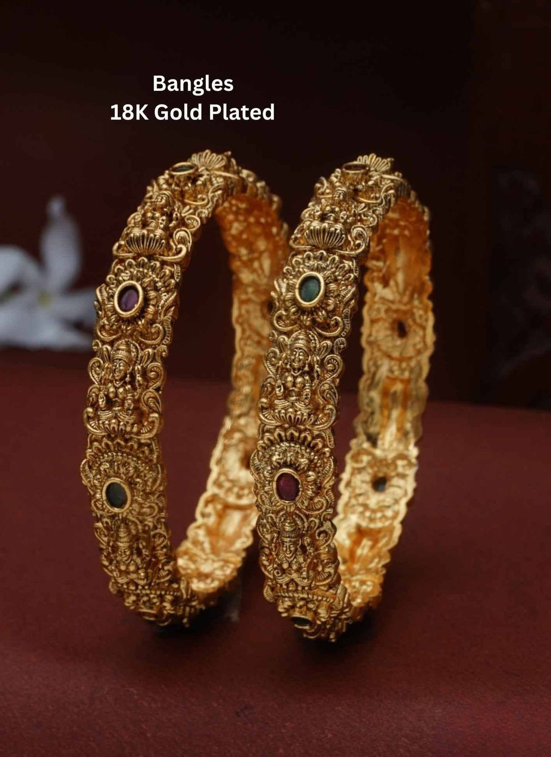 gold-plated bangles with intricate designs 