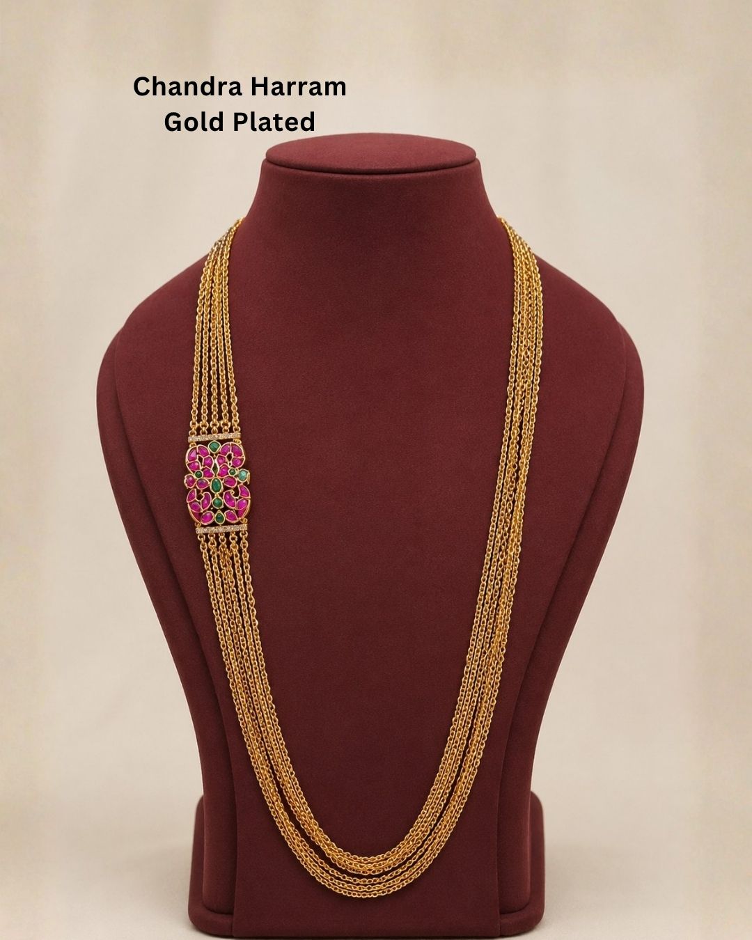 Beautiful multicolor stone gold plated long necklace featuring multiple layered chains and a detailed pink and green stone pendant. Perfect for festive occasions, traditional outfits, parties, temple visits, and gifting.