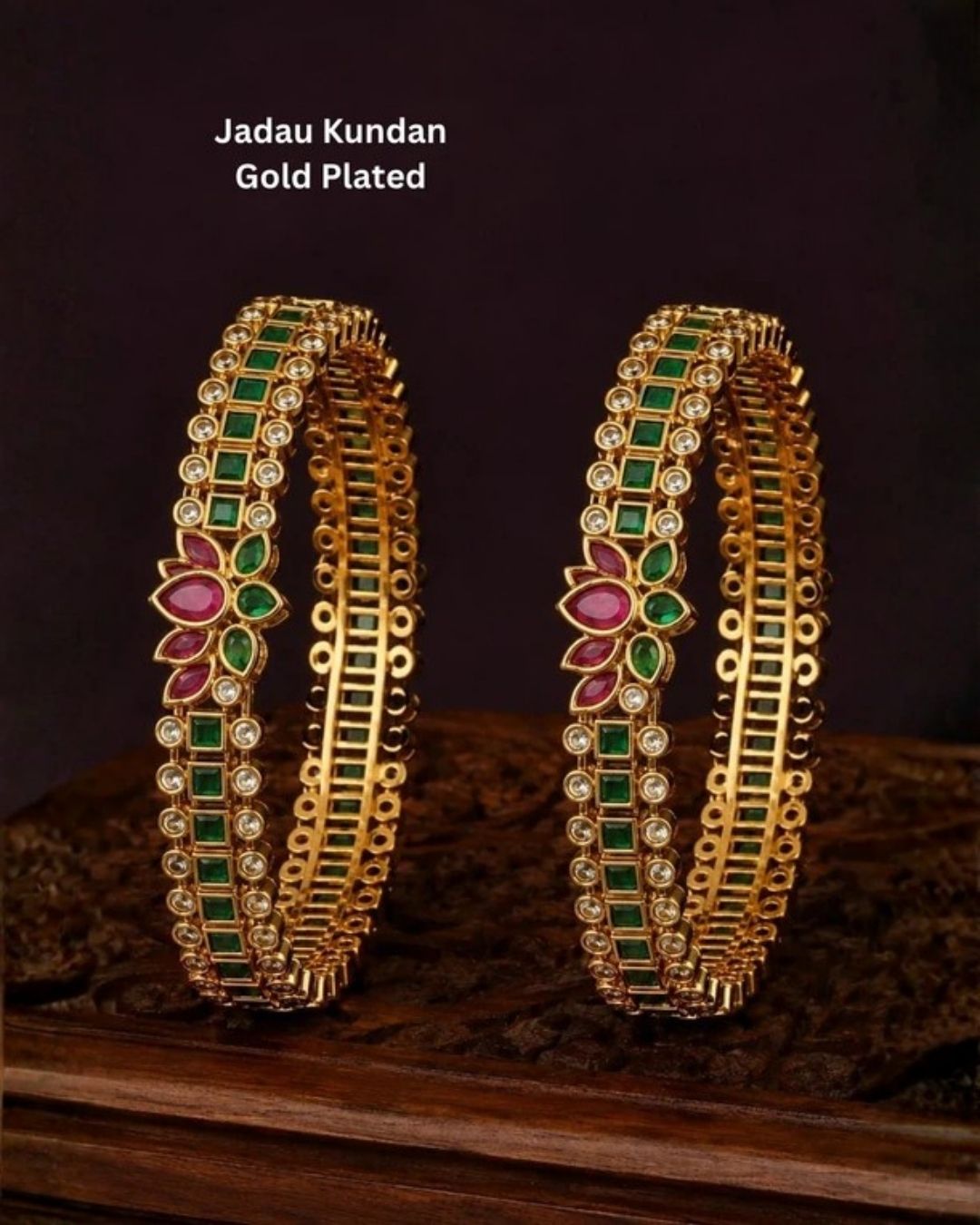 Designer emerald floral bangles with brilliant zircon stones and vibrant ruby-inspired floral motifs.
Expertly crafted with premium gold plating for a luxurious traditional appearance.
Perfect for weddings, festivals, ethnic wear, and gifting.