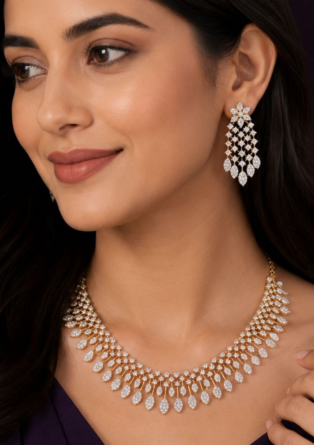 Modern Indian woman styling a zircon diamond gold plated necklace set with matching designer earrings. The jewelry features brilliant diamond-look zircon stones, delicate leaf-shaped danglers and a lightweight elegant finish that beautifully complements sarees, lehengas, gowns and traditional ethnic outfits.
