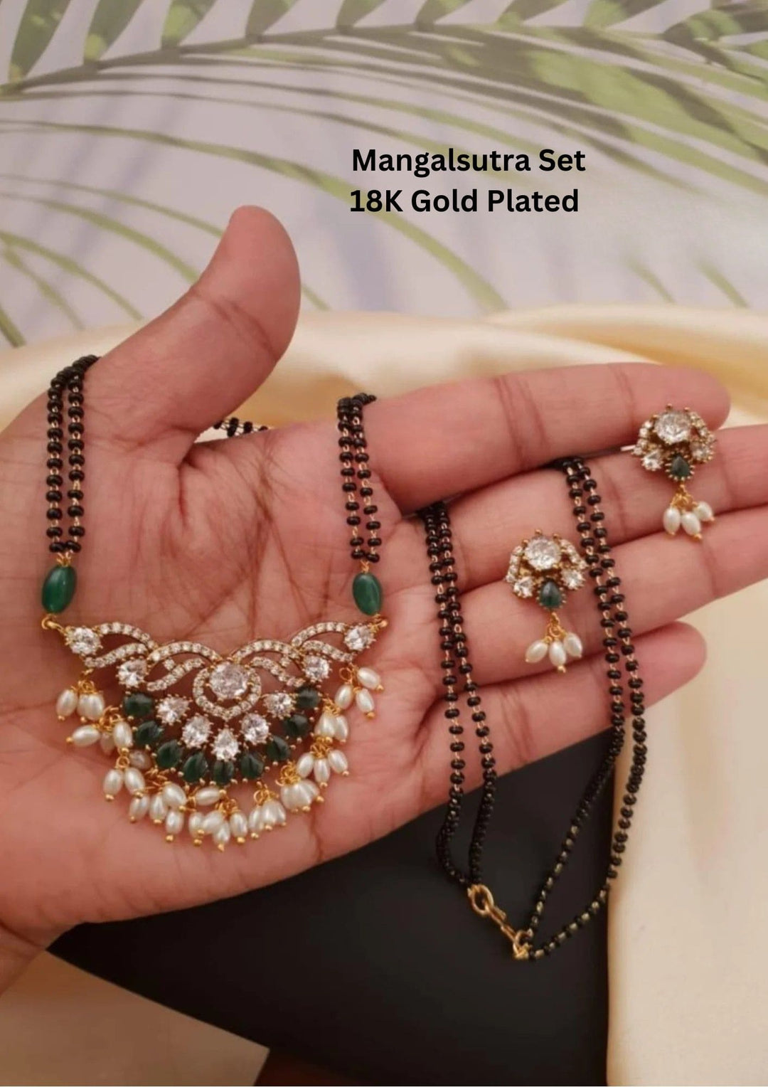 Mangalsutra set with gold plating green gemstones