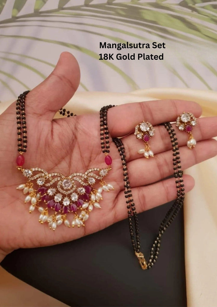 Mangalsutra set with gold plating red gemstones