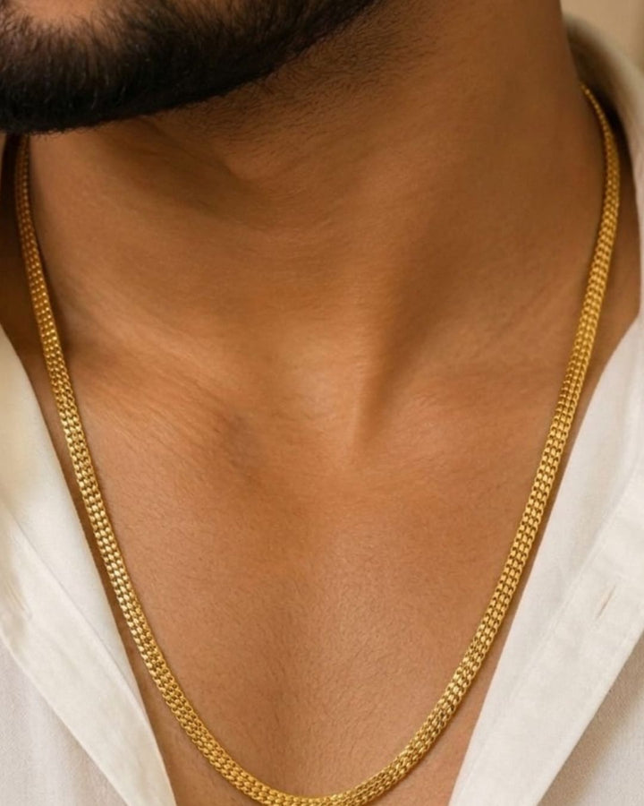 Beautiful sleek gold plated snake chain necklace with a smooth woven texture. Perfect for daily wear, layering with pendants, traditional outfits, festive occasions, and gifting.