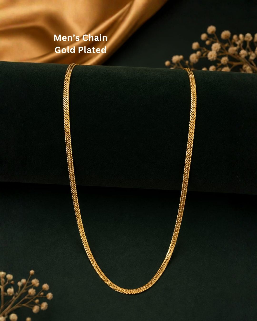 Premium men’s gold plated herringbone chain displayed across a hand, showcasing its sleek flat-link pattern, smooth finish, and elegant golden shine. Suitable for everyday wear, casual outfits, festive occasions, and gifting.