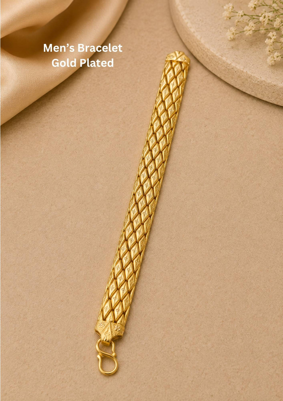 Elegant textured gold plated bracelet for men crafted with a premium finish, detailed diamond motifs, and a durable hook closure.