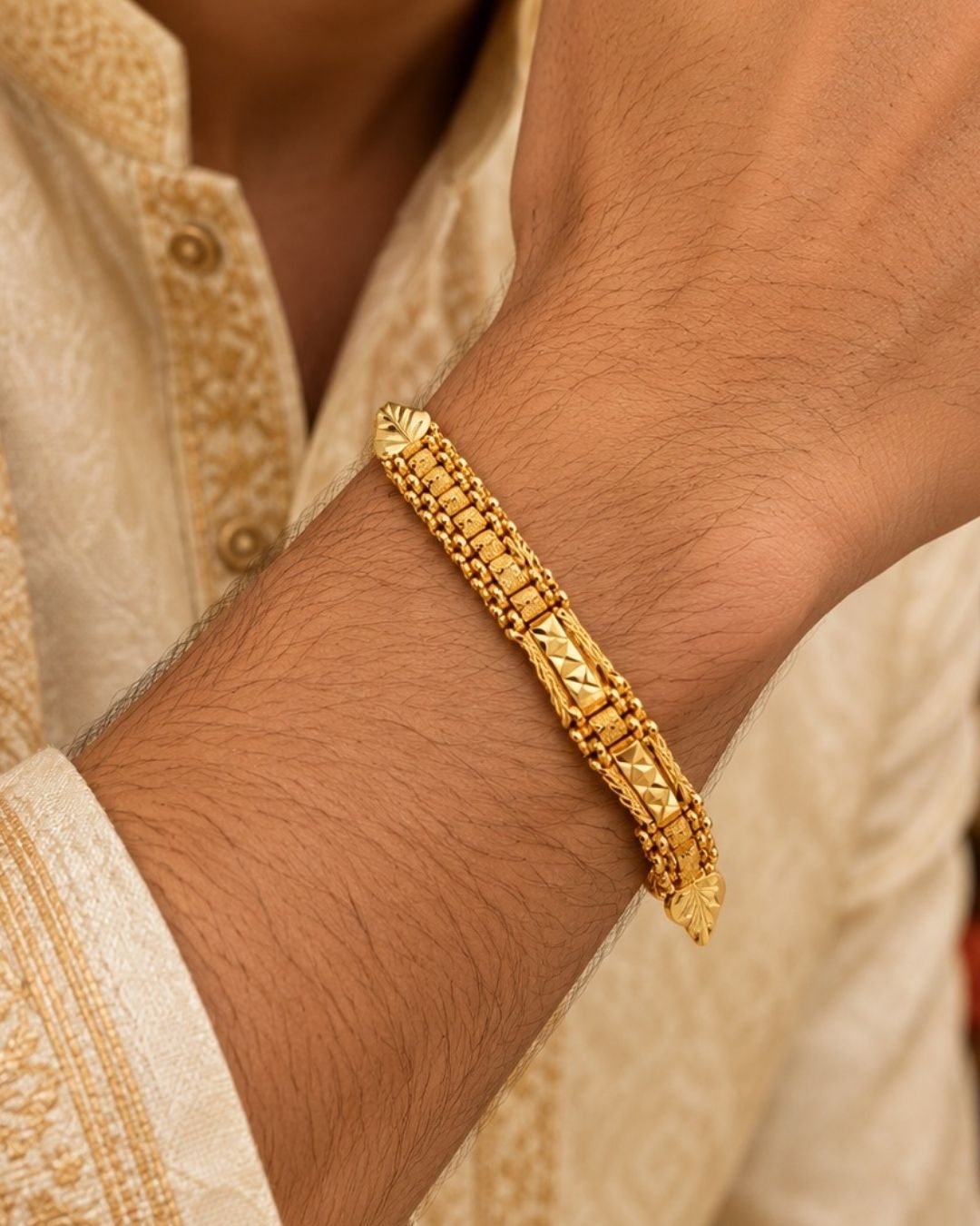 Elegant gold plated men’s designer bracelet featuring detailed rectangular links, geometric patterns, and a classic polished finish, perfect for traditional and modern wear.