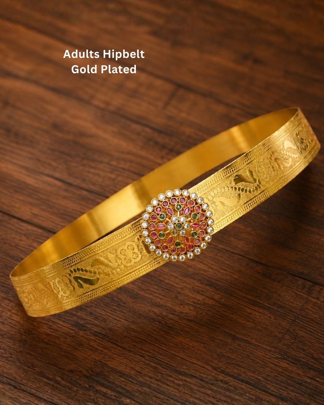 Beautiful gold plated designer hip belt featuring pink, green, and white stone accents with a removable floral pendant. Suitable for kids and adults, perfect for traditional outfits, festive occasions, dance performances, weddings, and special events.