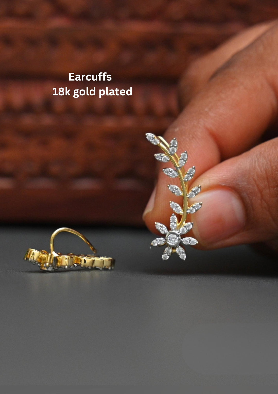 Floral zircon diamond gold plated earrings featuring sparkling white zircon stones arranged in elegant flower petal design with premium gold plated finish and stylish diamond look detailing. These lightweight earrings are crafted with pear cut zircon stones that provide a rich and classy appearance suitable for daily wear, office wear, weddings, festivals, parties, family gatherings, sarees, kurtis, lehengas and western outfits with skin friendly quality, anti fade polish, comfortable fitting and Cash on De