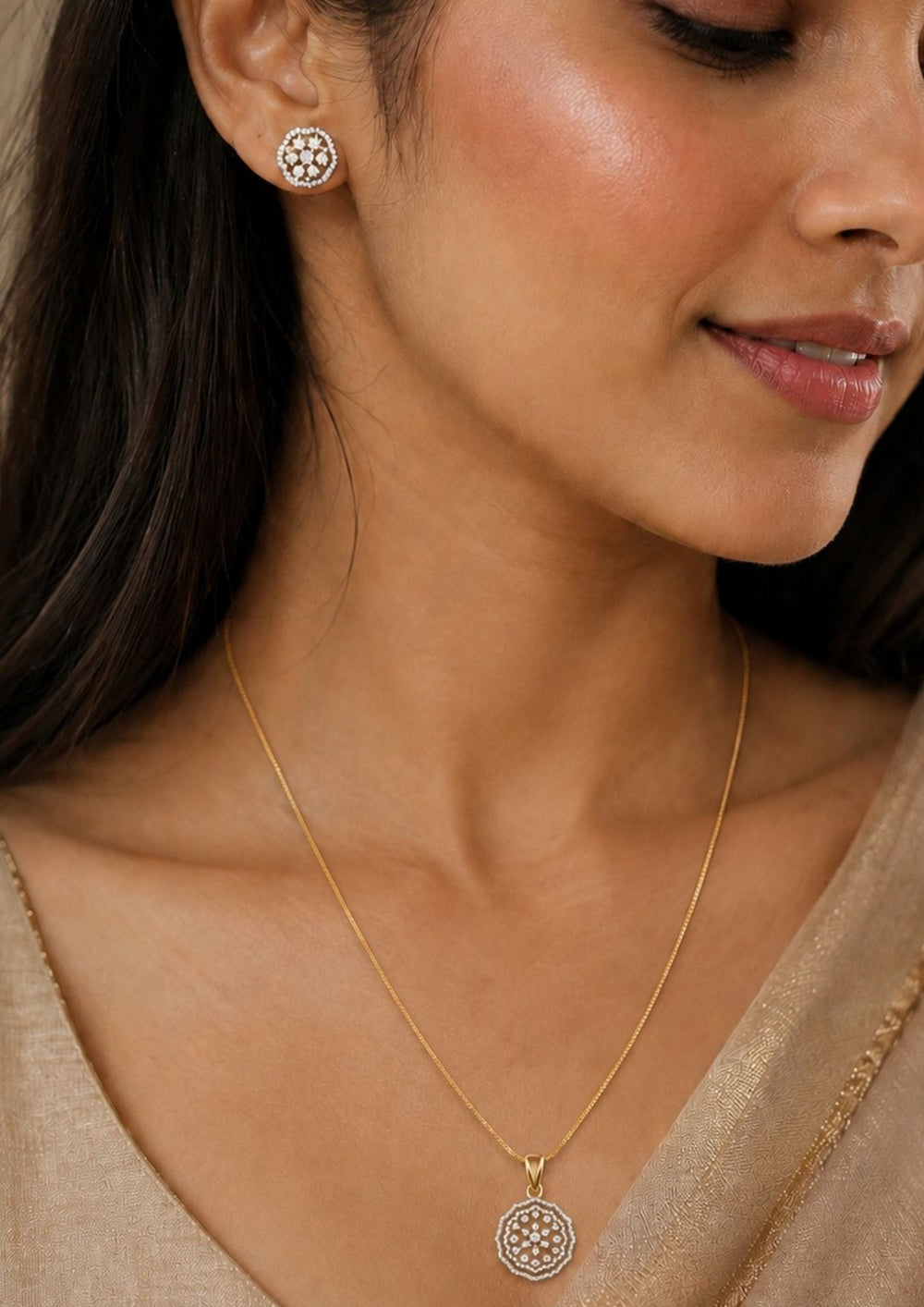 South Indian Woman wearing a zircon diamond gold-plated pendant and earring set. The intricate, webbed mandala design provides a lightweight yet brilliant aesthetic, perfectly suited for layering or subtle everyday festive luxury.