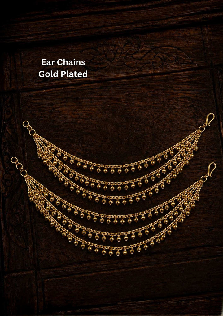 Elegant gold plated multi-layer waist chain featuring delicate dangling beads, designed to complement sarees, lehengas, and bridal attire.