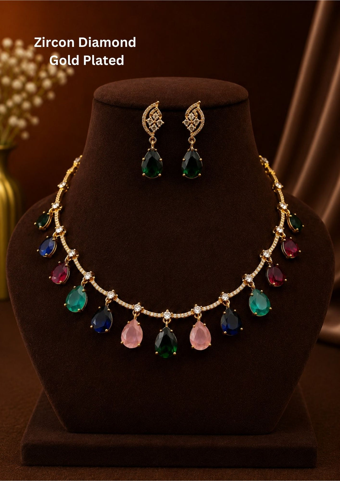 Multicolored gemstone necklace and earrings on a black stand with 'Zircon Diamond Gold Plated' text.