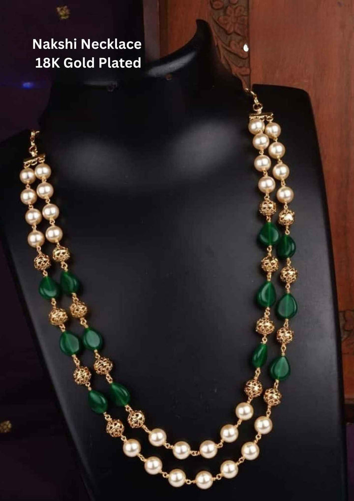 Nakshi necklace with gold plating and green stones