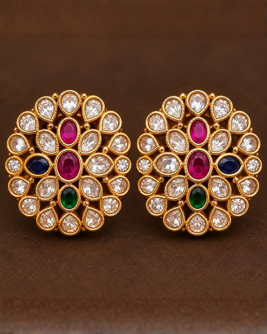 South Indian Woman wearing a gold plated navaratna set with matching studs . this chain was designed in flower model and gemestones are placed inrectangular cuts and this chain cam ewith matching studs that are designed in flower shapr with zircon stones thhis is anti fade color and partywear, receptions and perfect for weddings