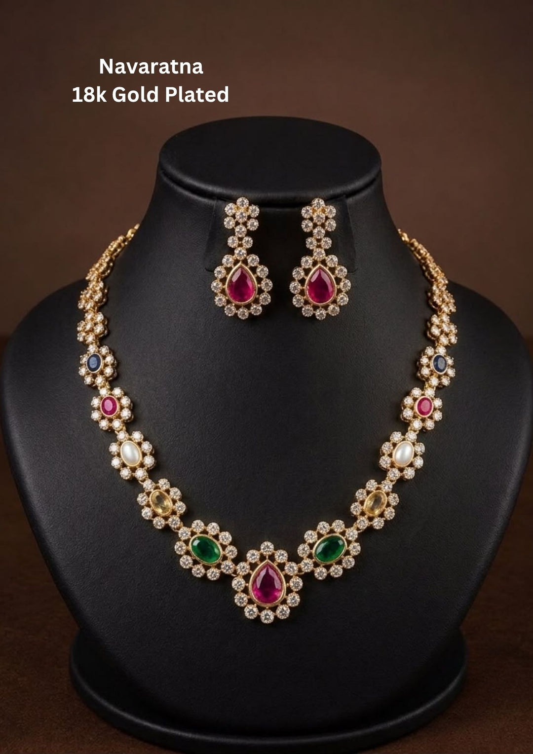 Elegant Navaratna jewellery set crafted with vibrant multicolor stones, brilliant CZ accents, and matching earrings for weddings and festive occasions.