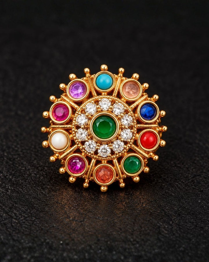 Close-up of an ear wearing a colorful earring in south indian traditional look  gold plated can be used for  flat detail for functional, festive , south indian festival 