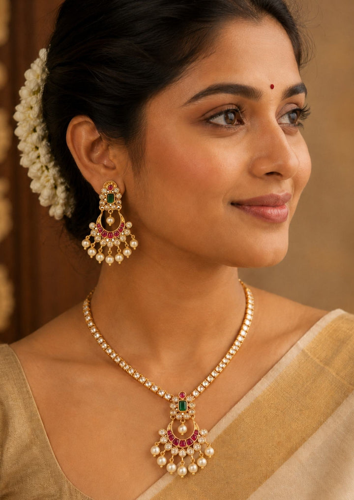 Jadau Kundan Gold Plated Necklace with Chand Bali Earrings wore by traditional south indian women can see the necklace with very details and also earrings with pearl drops and 