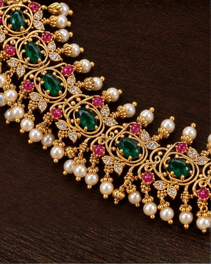 Gold Plated Guttapusalu Necklace Set with Peacock Design Earrings