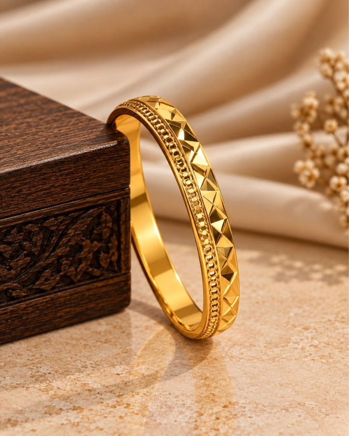 Gold Plated Men’s Kada with Geometric Diamond-Cut Design