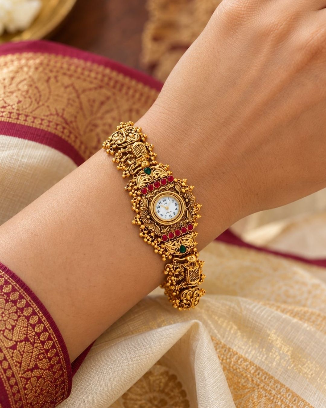Gold Plated Antique Bracelet Watch with Intricate Elephant Design