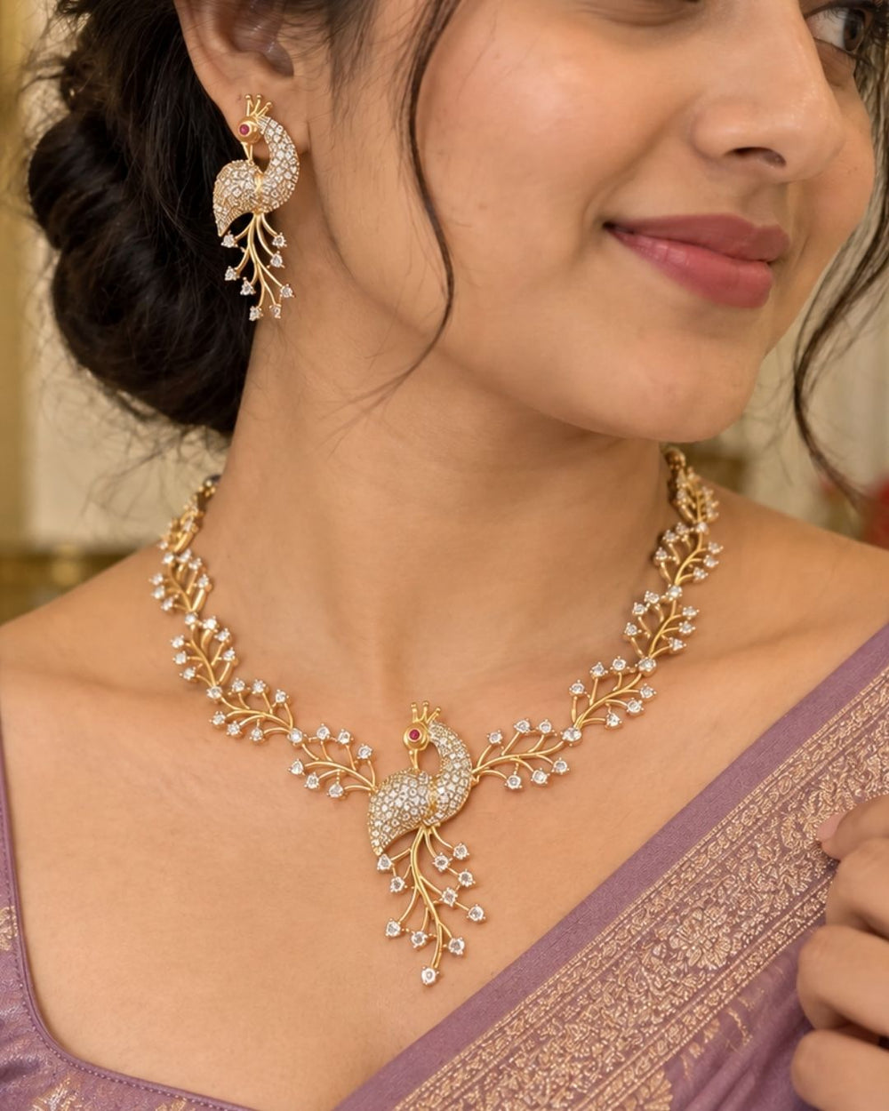 Premium peacock-inspired necklace set crafted with shimmering zircon stones and matching earrings. Beautiful zircon diamond gold plated peacock necklace set featuring elegant leaf patterns, sparkling zircon stones, and matching peacock earrings. Perfect for weddings, receptions, festive occasions, and party wear.