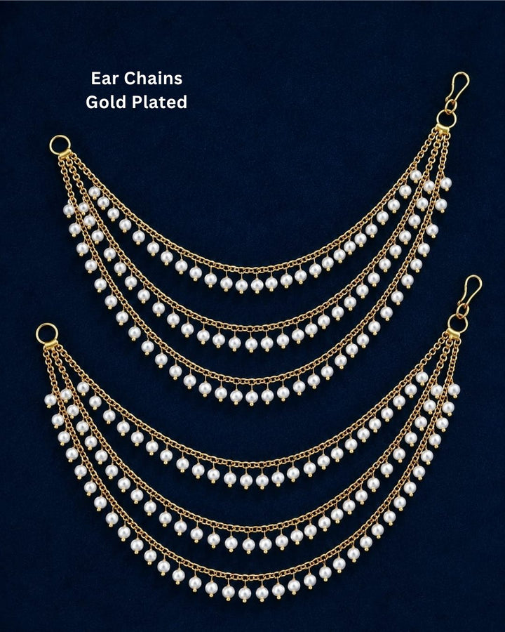 Gold-plated multi-strand chain ear chains decorated with small white pearl-like beads, displayed on a dark navy blue background with the text &