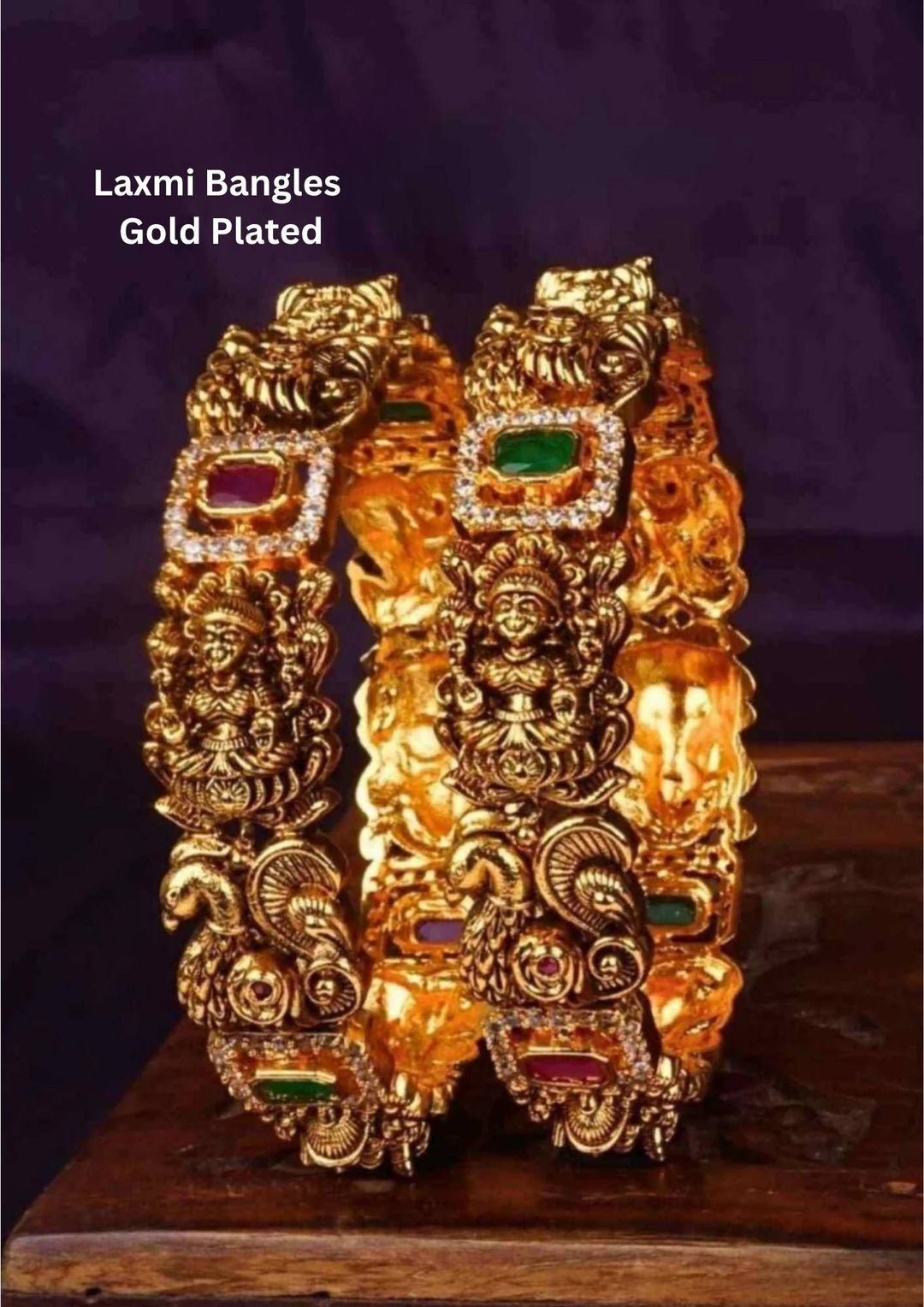 gold plated nakshi frame Goddess Lakshmi temple bangles showing alternating ruby and emerald stone inserts that give a graceful traditional and modern look for marriage functions