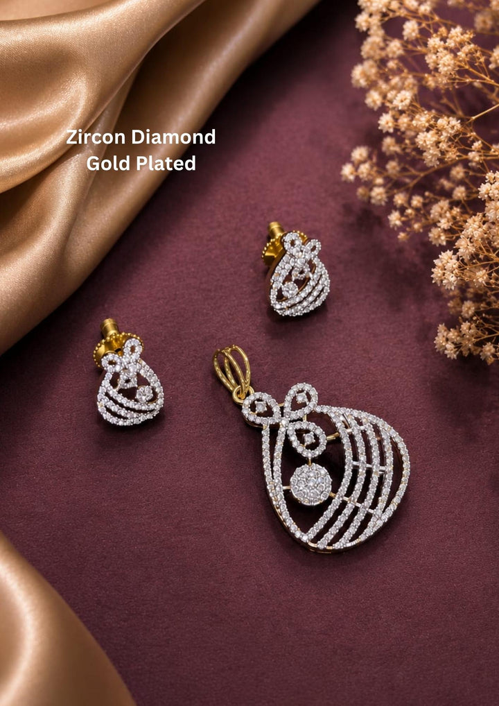 Zircon diamond gold plated pendant with matching earrings featuring a sparkling floral bow-inspired design. with brilliant crystal detailing and matching stud earrings.Perfect for daily wear, gifting and special occasions.