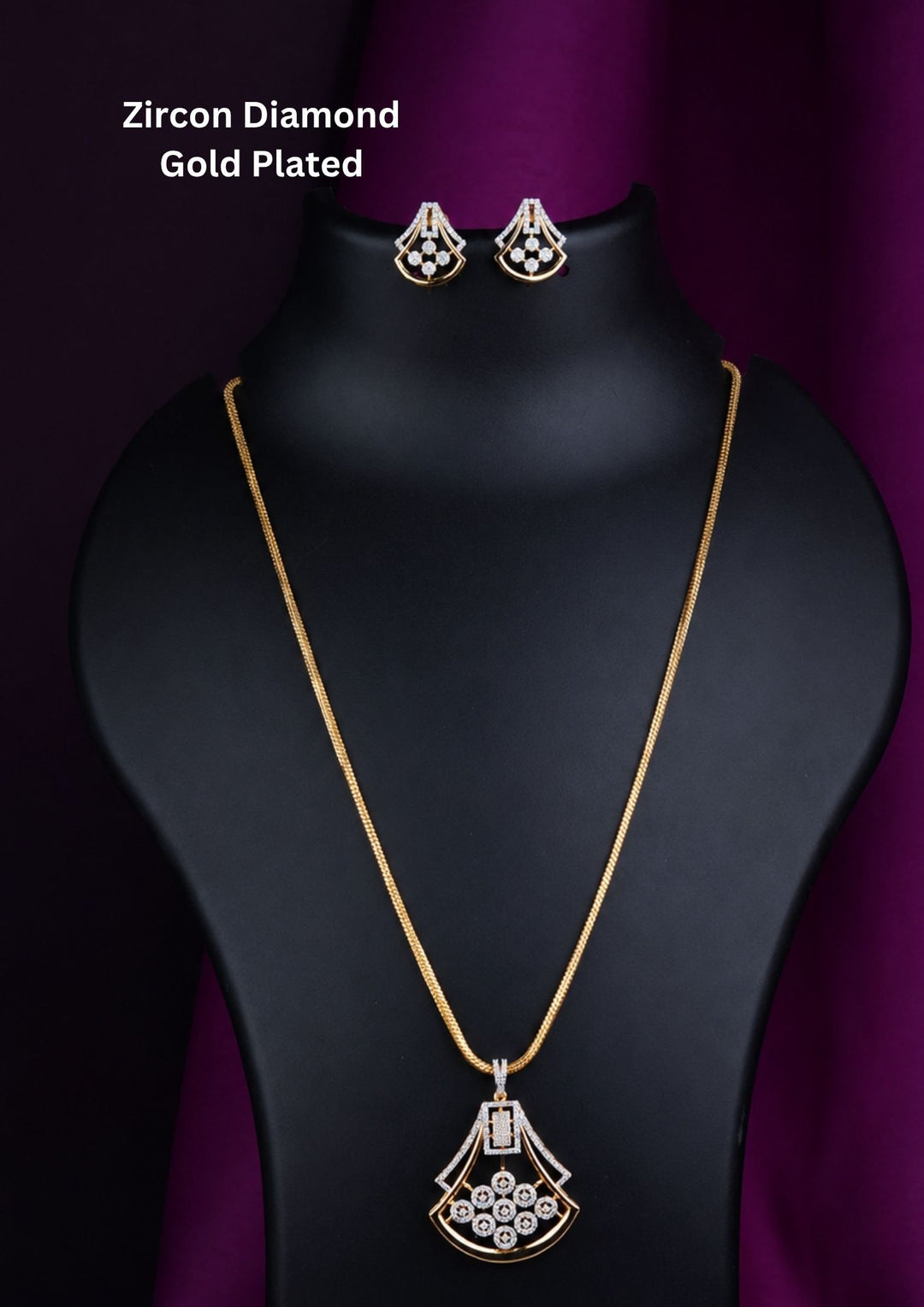 Elegant gold plated zircon diamond pendant set with sparkling crystal detailing and matching stud earrings. Perfect for daily wear, parties and gifting.