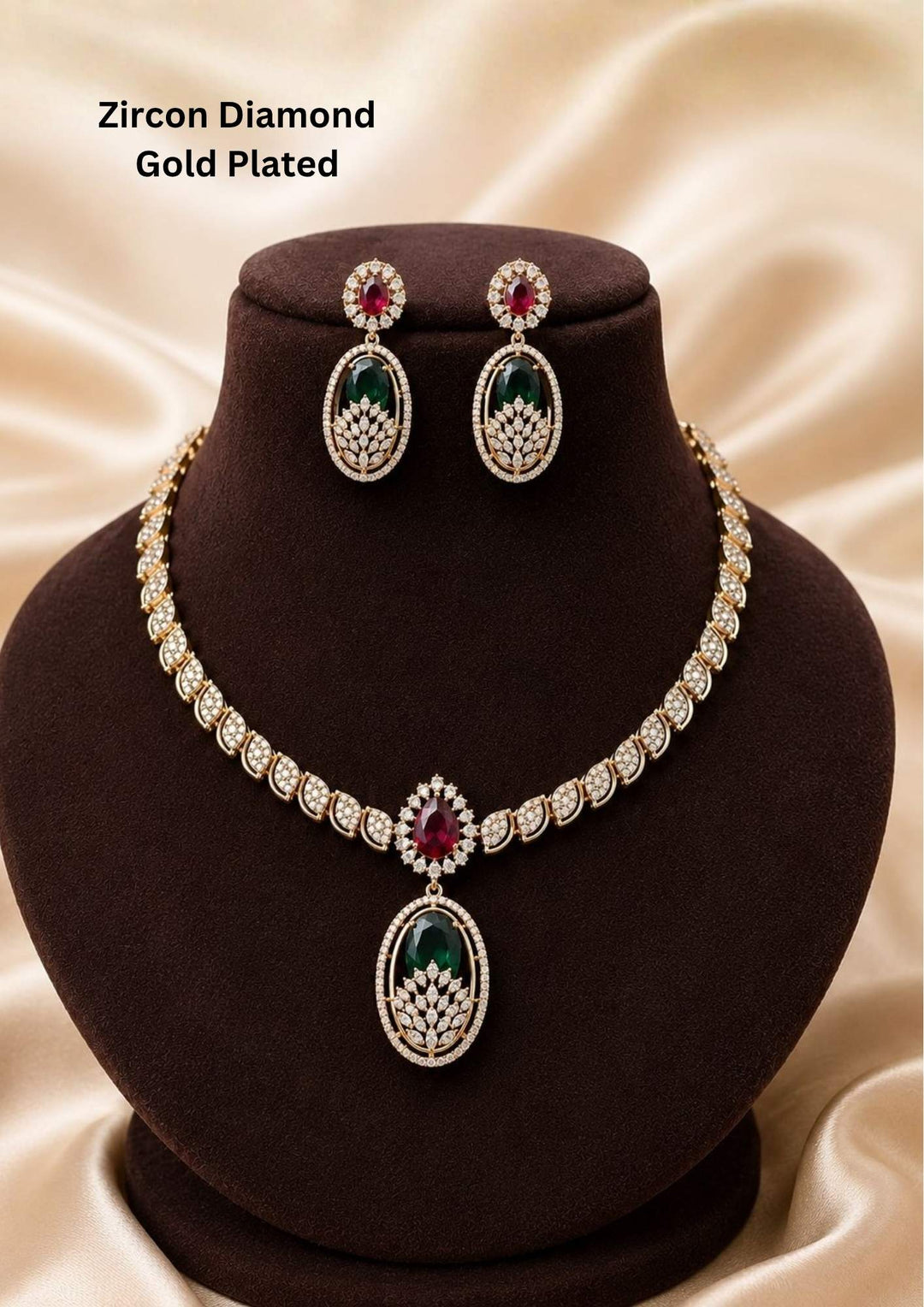 Gold plated short necklace and matching hanging earrings set densely embedded with premium, brilliant-cut white Zirconia diamonds. The design highlights alternating square or oval-cut vibrant green emeralds and rich ruby red gemstones as central accents, providing a colorful, highly glamorous traditional look suitable for grand weddings, receptions, and family parties.